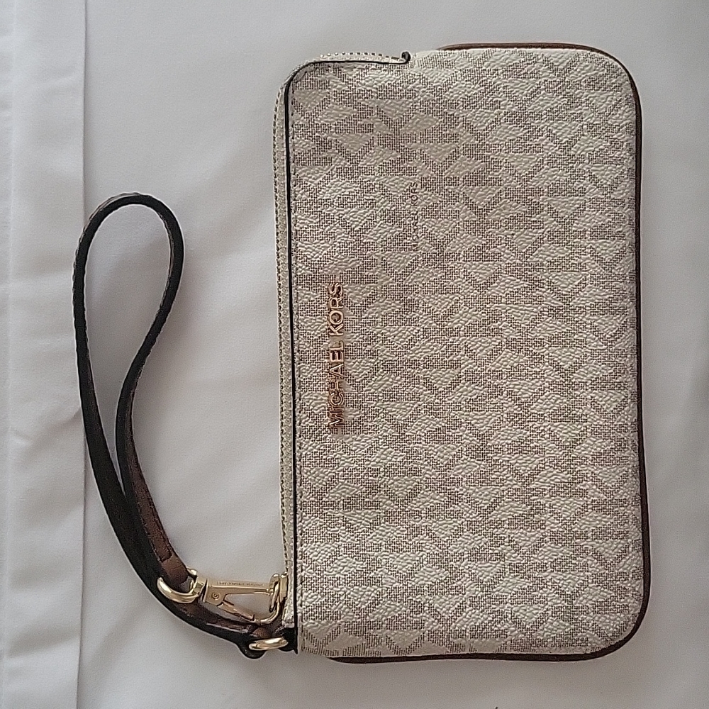 Michael kors signature wristlet purse.
